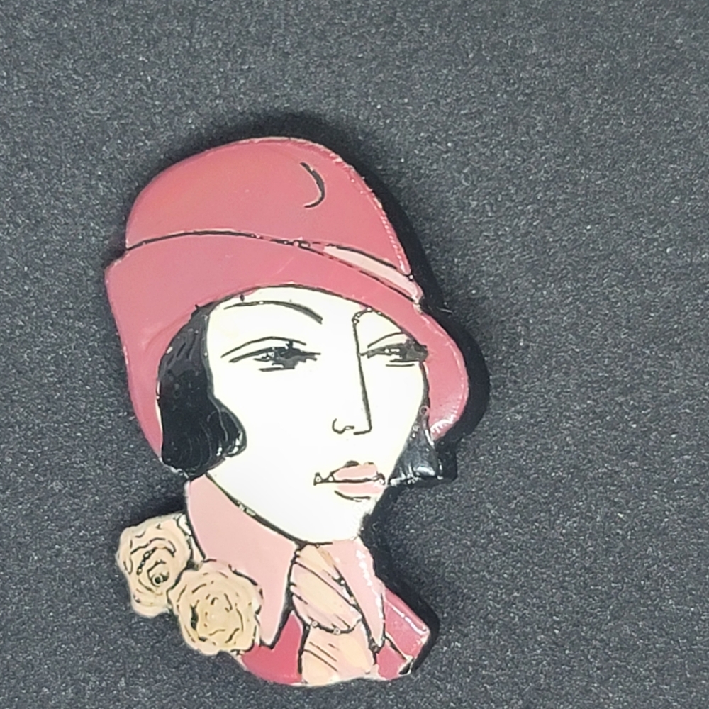 Vintage brooch. Flapper girl.